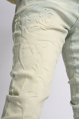 "LOVE IS PAIN" EMBOSSED SKINNY DENIM (LIGHT BLUE/SAND)