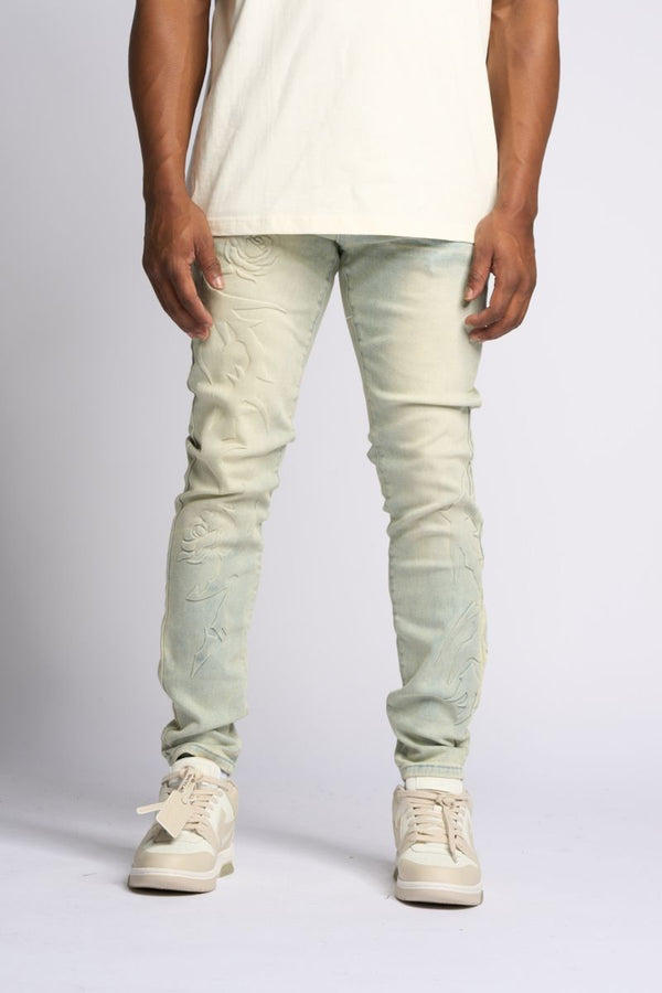 "LOVE IS PAIN" EMBOSSED SKINNY DENIM (LIGHT BLUE/SAND)